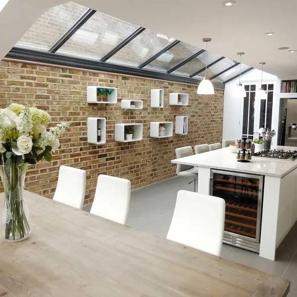 Kitchen interior with exposed brick and a glazed roof