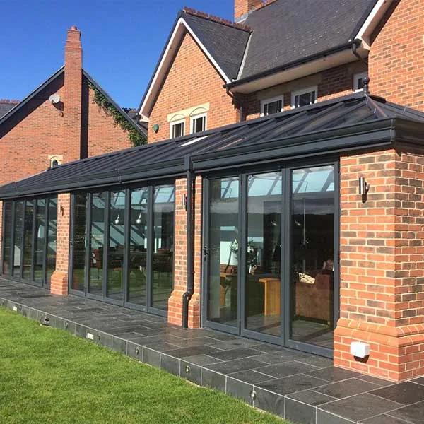 Side-return extension with dark framed glazing